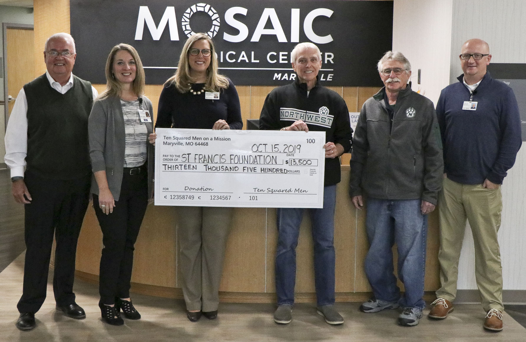 Ten Squared Men gives to St. Francis